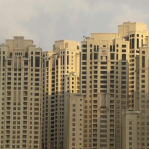 A close-up view of modern high-rise buildings in Dubai Marina, showcasing architectural detail and luxury living.